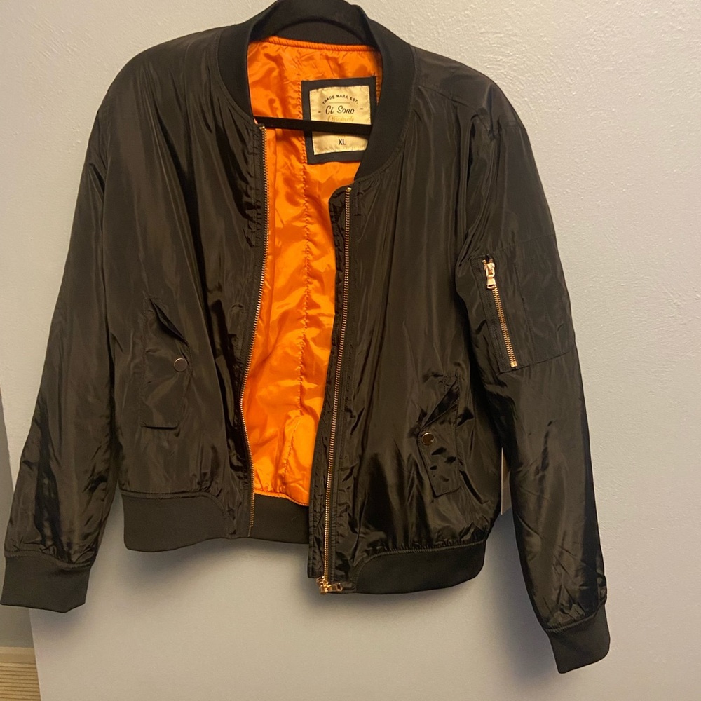 Black, water resistant bomber jacket, gold details